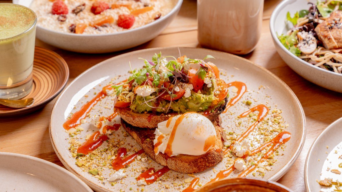 Overhead spread of plated brunch dishes