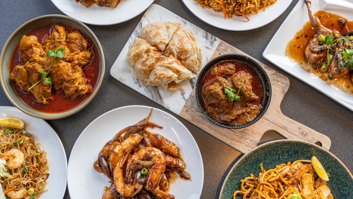 Shared plates spread of Asian-style dishes