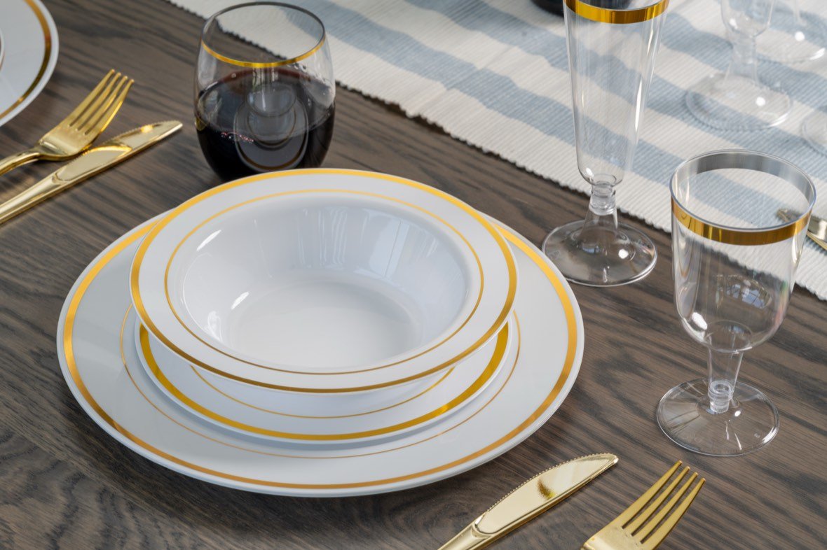 Gold-rimmed tableware flatlay