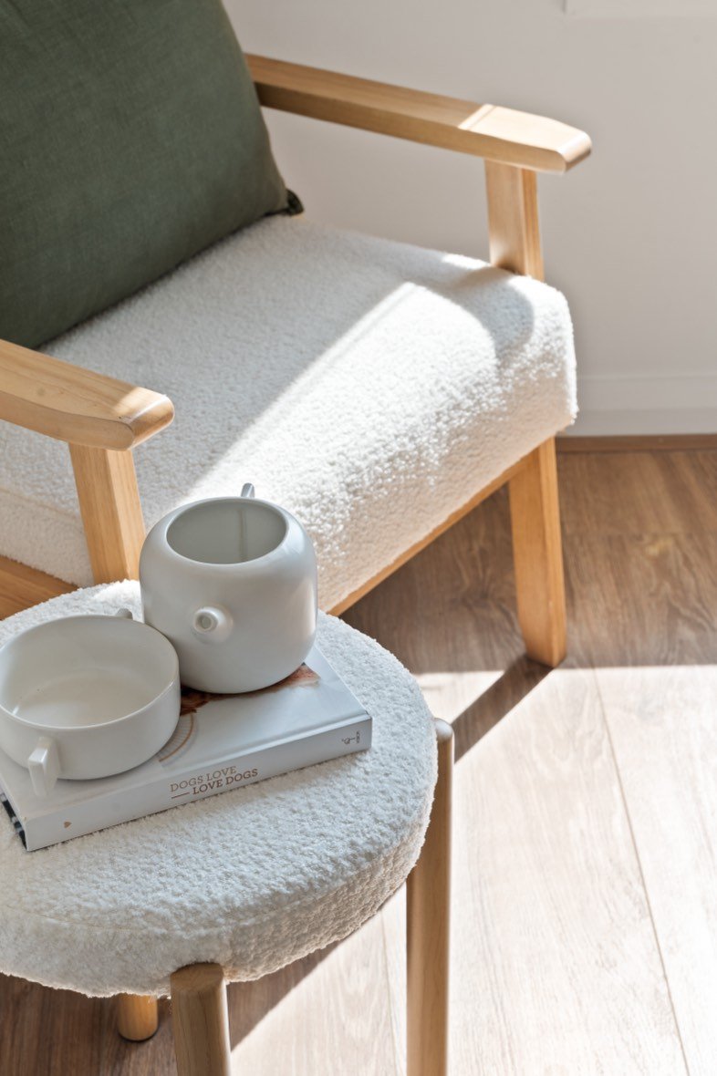 Styled armchair and side-table detail